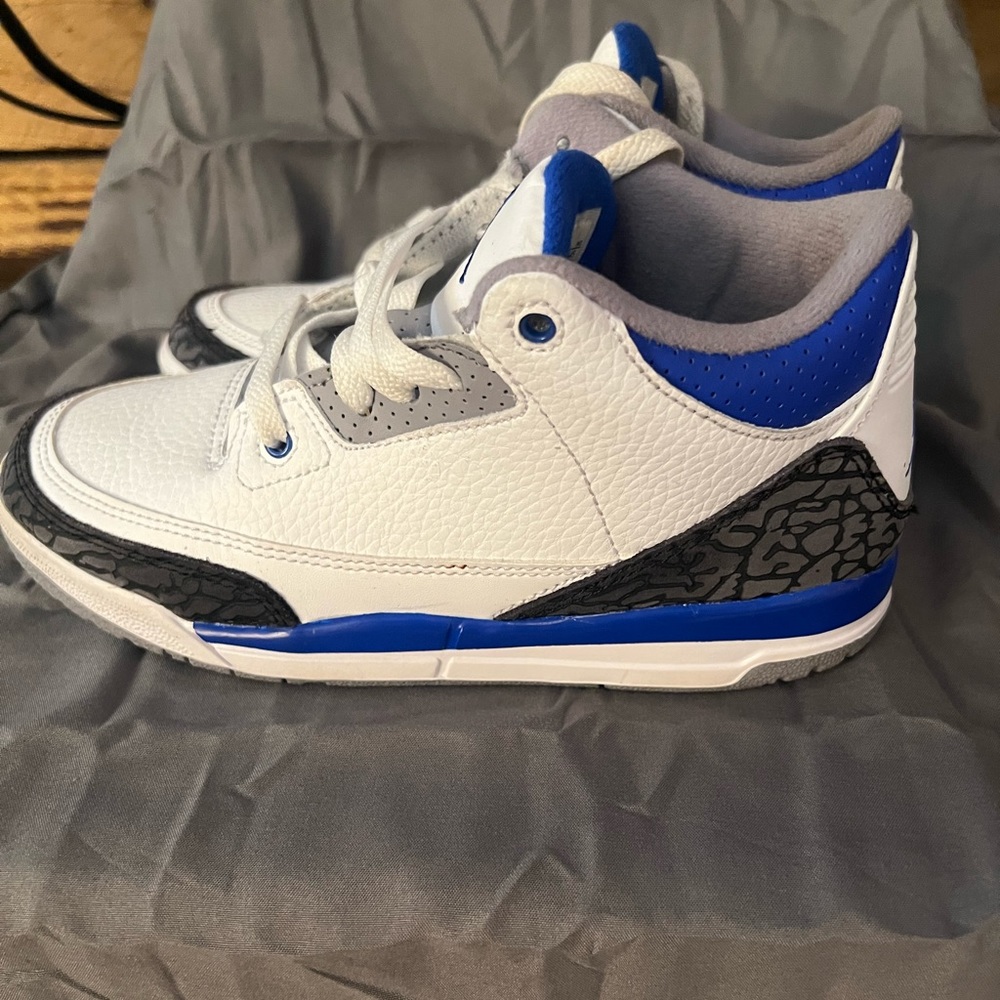 Jordan four grade school boys size 2.5 . In great used condition